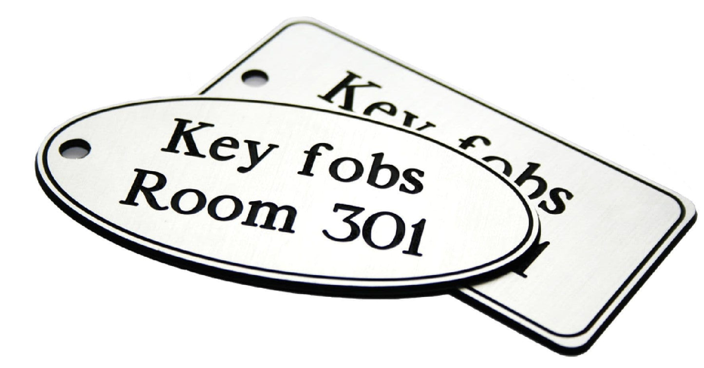 51537 50x100mm Key fob rectangle - White text on black (50x100mm) Safety Sign