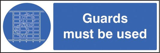 15405G Guards must be used Rigid Plastic (300x100mm) Safety Sign