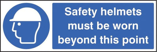 25018M Safety helmets must be worn beyond Self Adhesive Vinyl (600x200mm) Safety Sign