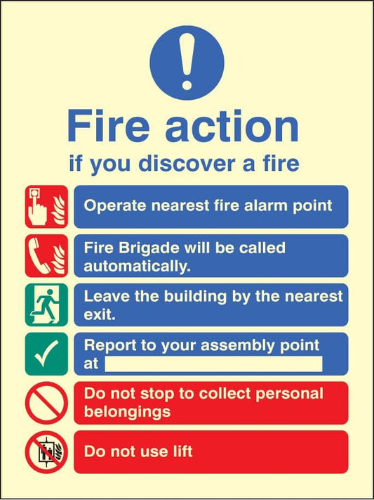 31428E Fire action auto dial with lift Photoluminescent Rigid (200x150mm) Safety Sign