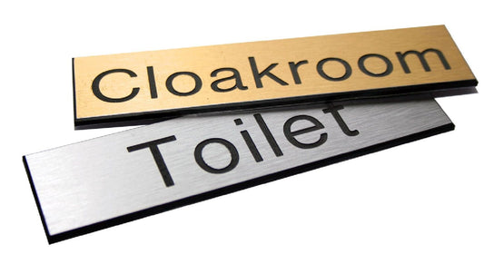51497 Engraved Sign with adhesive backing - 140x35mm dia Black text on brass effect  (140x35mm)